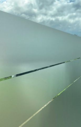 zandstraalfolie raam wachtruimte